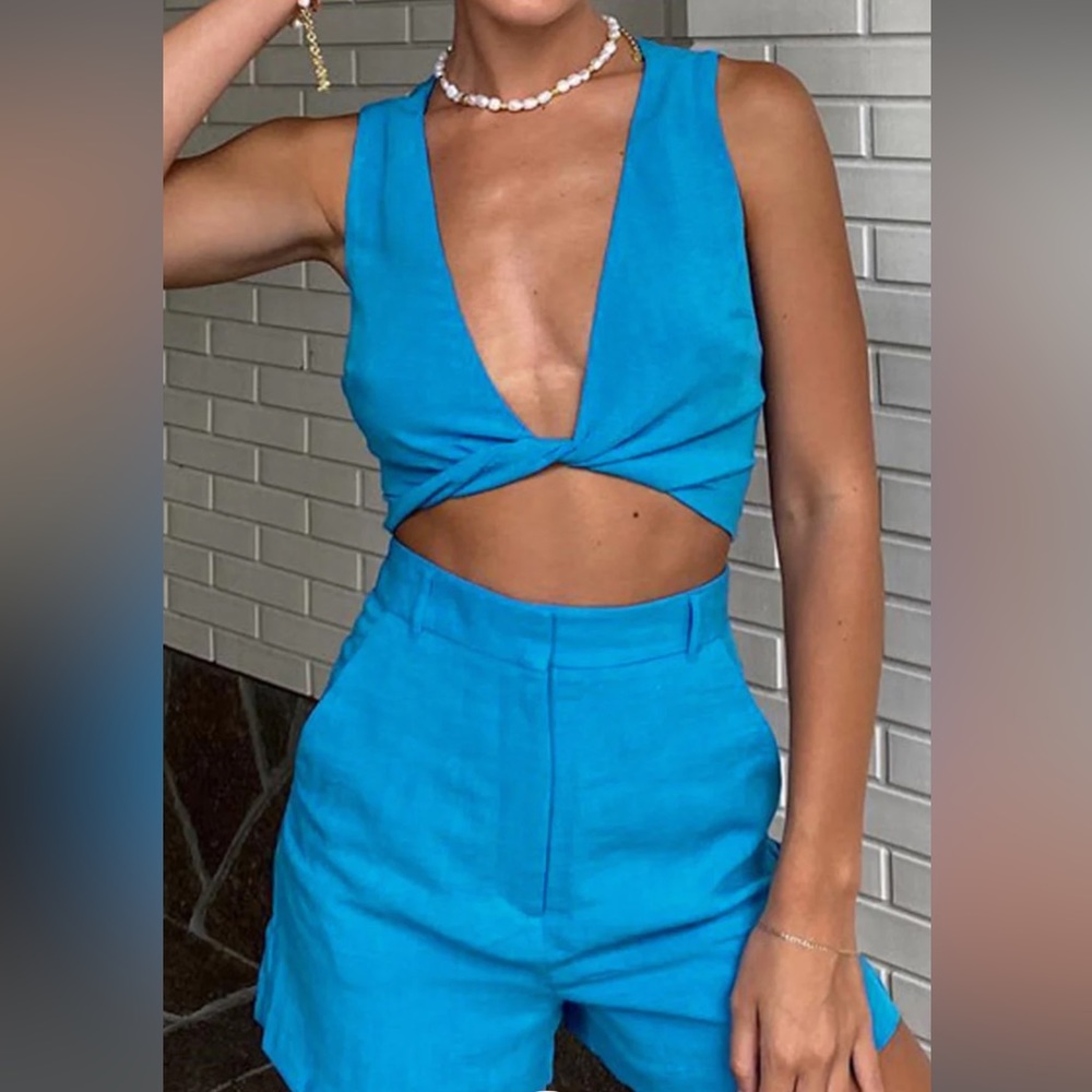 Never worn!! Tags still on!! Blue two piece set.